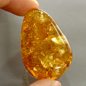 30,46 ctw natürlicher orangefarbener Bernstein, Transparent, Transparent / Lichtdurchlässig