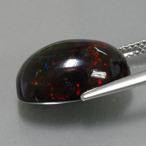 5,81 ctw natürlicher mehrfarbiger Schwarzer Opal, Oval Schliff, Lichtundurchlässig