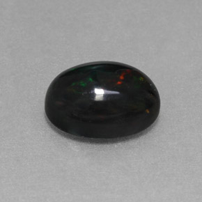 1,27 ctw natürlicher mehrfarbiger Schwarzer Opal, Oval Schliff, Lichtundurchlässig