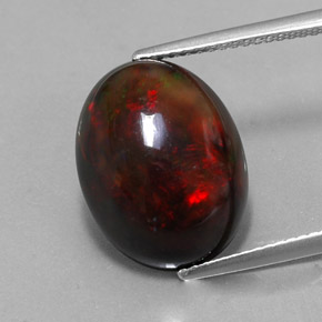 6,26 ctw natürlicher mehrfarbiger Schwarzer Opal, Oval Schliff, Lichtundurchlässig