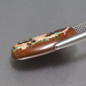10,49 ctw natürlicher mehrfarbiger Boulder-Opal, Oval Schliff, Lichtundurchlässig
