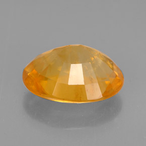 3,73 ctw natürlicher orangefarbener Calzit, Oval Schliff, VS-SI