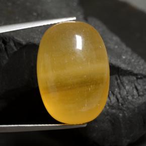 40,17 ctw natürlicher orangefarbener Calzit, Oval Schliff, Lichtdurchlässig