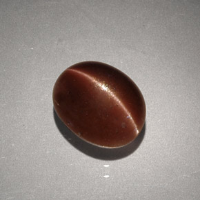 2,56 ctw natürlicher brauner Cat's Eye Scapolite, Oval Schliff, Lichtundurchlässig