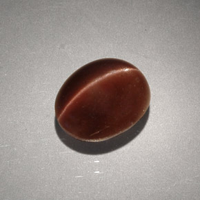2,56 ctw natürlicher brauner Cat's Eye Scapolite, Oval Schliff, Lichtundurchlässig