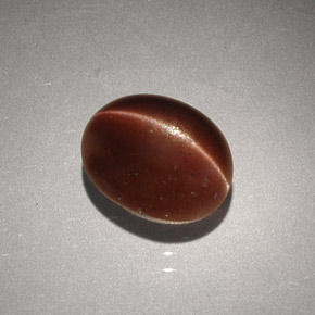 2,56 ctw natürlicher brauner Cat's Eye Scapolite, Oval Schliff, Lichtundurchlässig