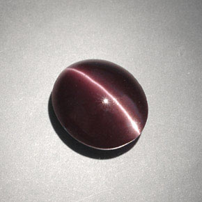 4,00 ctw natürlicher brauner Cat's Eye Scapolite, Oval Schliff, Lichtundurchlässig