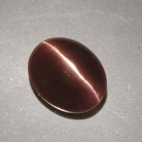 2,32 ctw natürlicher brauner Cat's Eye Scapolite, Oval Schliff, Lichtundurchlässig