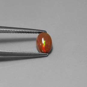 0,63 ctw natürlicher mehrfarbiger Schokoladenopal, Transparent, Transparent / Lichtdurchlässig