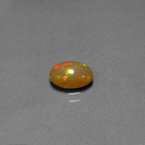 0,68 ctw natürlicher mehrfarbiger Schokoladenopal, Transparent, Transparent / Lichtdurchlässig