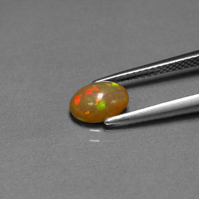 0,68 ctw natürlicher mehrfarbiger Schokoladenopal, Transparent, Transparent / Lichtdurchlässig