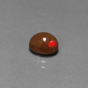 0,77 ctw natürlicher mehrfarbiger Schokoladenopal, Oval Schliff, Lichtundurchlässig