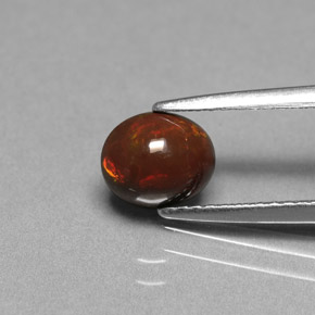 0,75 ctw natürlicher mehrfarbiger Schokoladenopal, Oval Schliff, Lichtundurchlässig