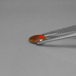 0,43 ctw natürlicher mehrfarbiger Schokoladenopal, Oval Schliff, Lichtundurchlässig