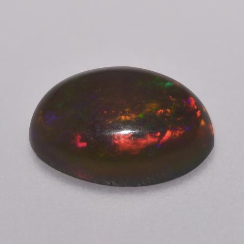 0,67 ctw natürlicher mehrfarbiger Schokoladenopal, Oval Schliff, Lichtdurchlässig