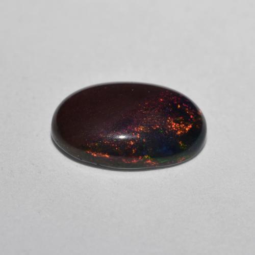 0,80 ctw natürlicher mehrfarbiger Schokoladenopal, Oval Schliff, Lichtdurchlässig