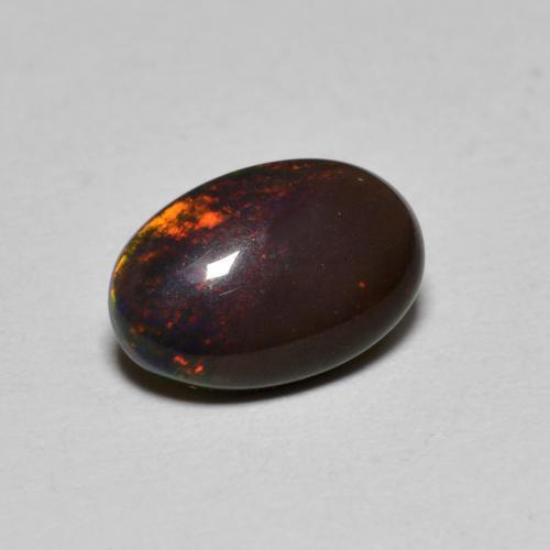0,80 ctw natürlicher mehrfarbiger Schokoladenopal, Oval Schliff, Lichtdurchlässig
