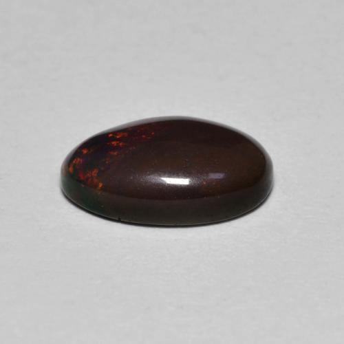 0,80 ctw natürlicher mehrfarbiger Schokoladenopal, Oval Schliff, Lichtdurchlässig