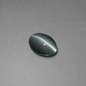 0,65 ctw natürlicher grauer Chrysoberyl Cat's Eye, Oval Schliff, Lichtundurchlässig