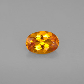 0,67 ctw natürlicher orangefarbener Clinohumit, Oval Schliff, VS
