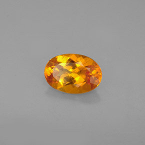 0,67 ctw natürlicher orangefarbener Clinohumit, Oval Schliff, VS
