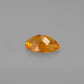 0,67 ctw natürlicher orangefarbener Clinohumit, Oval Schliff, VS