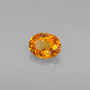 0,54 ctw natürlicher orangefarbener Clinohumit, Oval Schliff, VVS-VS