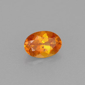 0,56 ctw natürlicher orangefarbener Clinohumit, Oval Schliff, VS-SI