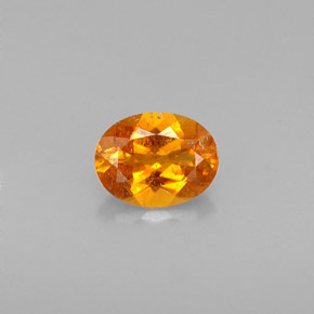 0,57 ctw natürlicher orangefarbener Clinohumit, Oval Schliff, VS-SI