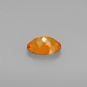 0,57 ctw natürlicher orangefarbener Clinohumit, Oval Schliff, VS-SI