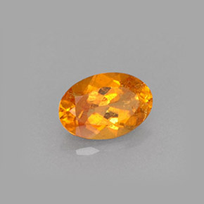 0,61 ctw natürlicher orangefarbener Clinohumit, Oval Schliff, VS-SI