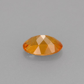 0,61 ctw natürlicher orangefarbener Clinohumit, Oval Schliff, VS-SI