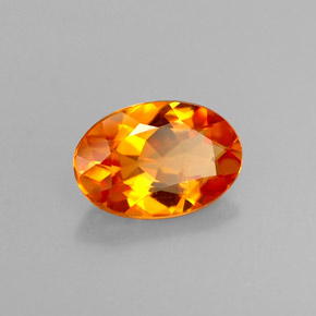 0,58 ctw natürlicher orangefarbener Clinohumit, Oval Schliff, VS