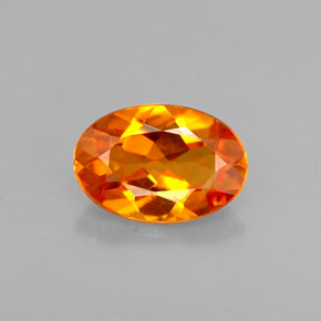 0,58 ctw natürlicher orangefarbener Clinohumit, Oval Schliff, VS