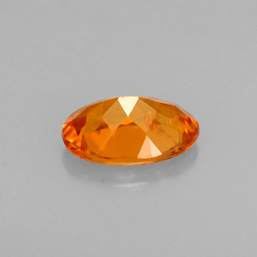 0,58 ctw natürlicher orangefarbener Clinohumit, Oval Schliff, VS
