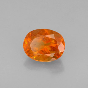 0,72 ctw natürlicher orangefarbener Clinohumit, Oval Schliff, VS-SI