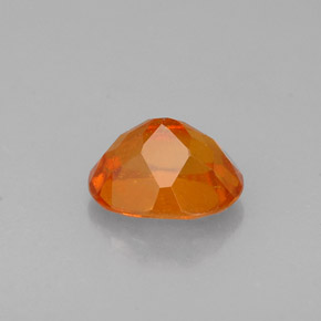 0,72 ctw natürlicher orangefarbener Clinohumit, Oval Schliff, VS-SI