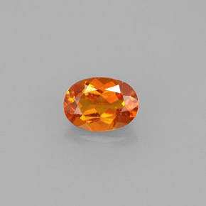 0,55 ctw natürlicher orangefarbener Clinohumit, Oval Schliff, VVS-VS