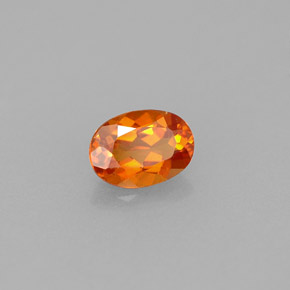 0,55 ctw natürlicher orangefarbener Clinohumit, Oval Schliff, VVS-VS