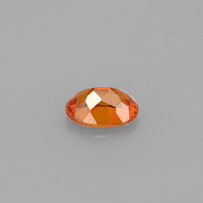 0,55 ctw natürlicher orangefarbener Clinohumit, Oval Schliff, VVS-VS