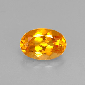 0,52 ctw natürlicher orangefarbener Clinohumit, Oval Schliff, VS