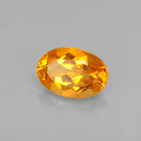 0,52 ctw natürlicher orangefarbener Clinohumit, Oval Schliff, VS