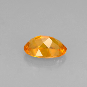 0,52 ctw natürlicher orangefarbener Clinohumit, Oval Schliff, VS