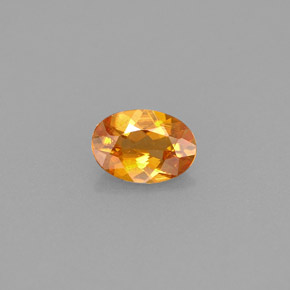 0,42 ctw natürlicher orangefarbener Clinohumit, Oval Schliff, VS