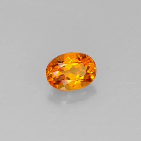 0,44 ctw natürlicher orangefarbener Clinohumit, Oval Schliff, VS
