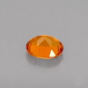 0,48 ctw natürlicher orangefarbener Clinohumit, Oval Schliff, VVS-VS