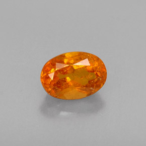 0,52 ctw natürlicher orangefarbener Clinohumit, Oval Schliff, VS-SI