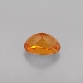 0,52 ctw natürlicher orangefarbener Clinohumit, Oval Schliff, VS-SI