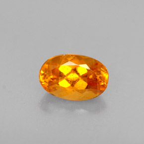 0,47 ctw natürlicher orangefarbener Clinohumit, Oval Schliff, VS-SI
