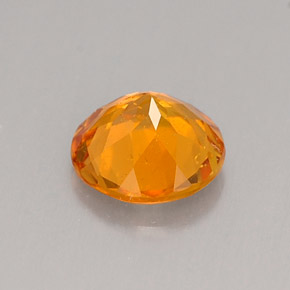 0,62 ctw natürlicher orangefarbener Clinohumit, Rundschliff, VS-SI
